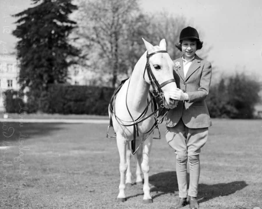 Young princess Elizabeth II in Jodhpur boots and pants